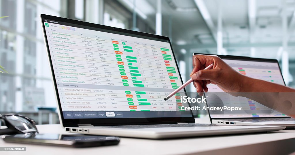 Young African Woman Analyzing Medical Data On Laptop Computer